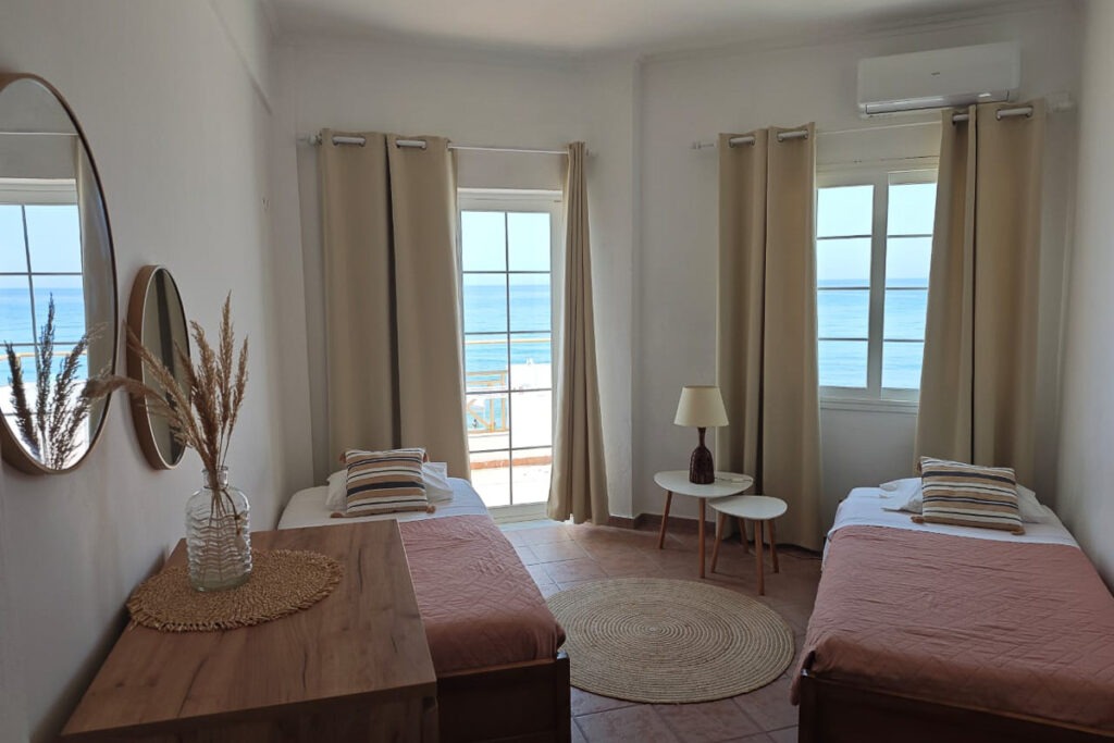 The two single beds-sofas in Pasithea apartment.