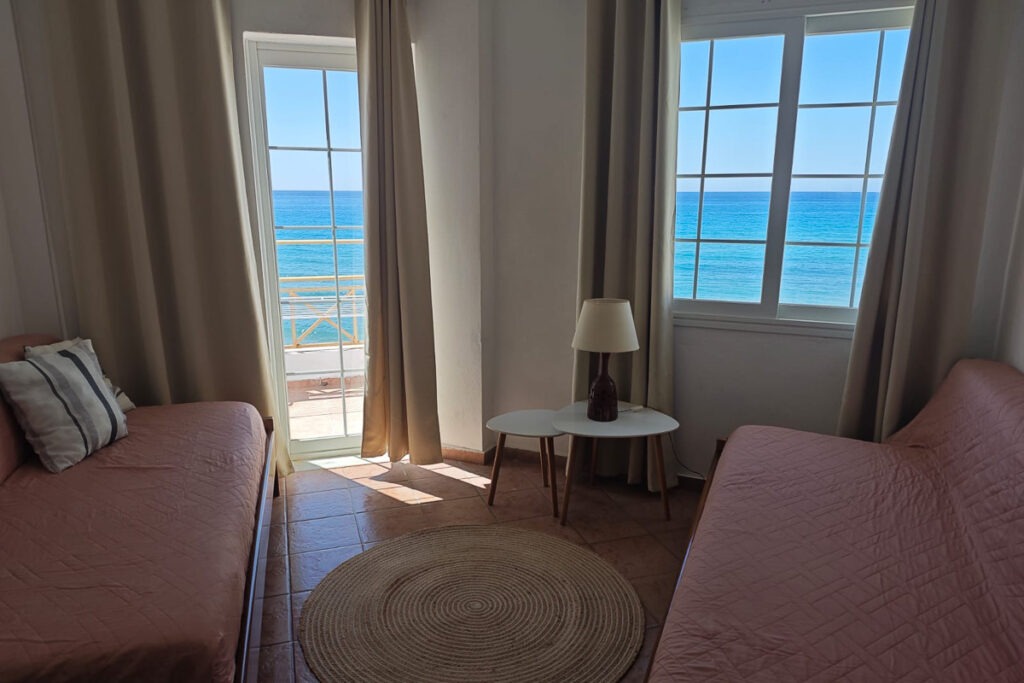 The two sofas of Pasithea's apartment living room.